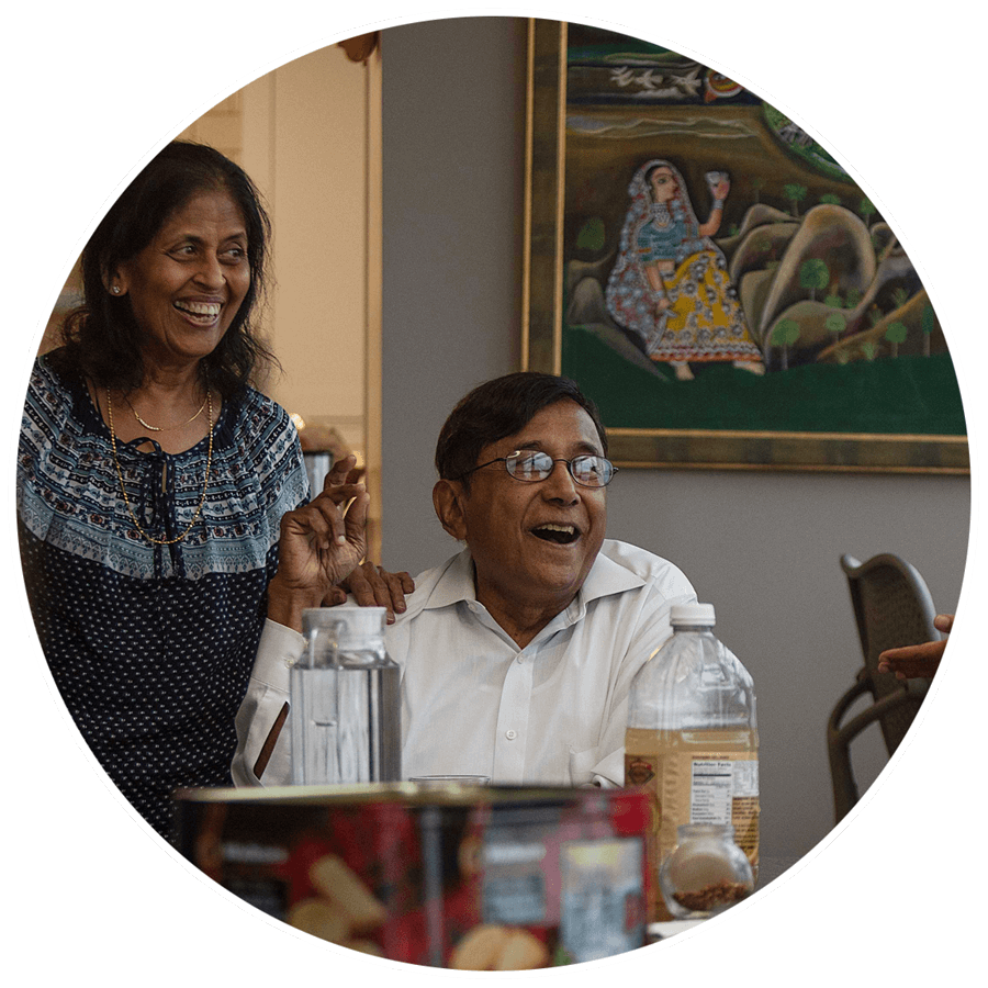 Nalini and shyam parikh smiling together - parikh parivar